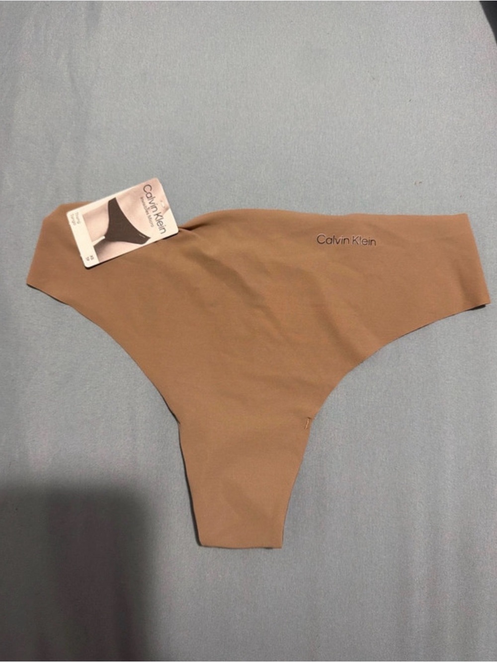 Calvin Klein No-Show Seamless Thong in Tan